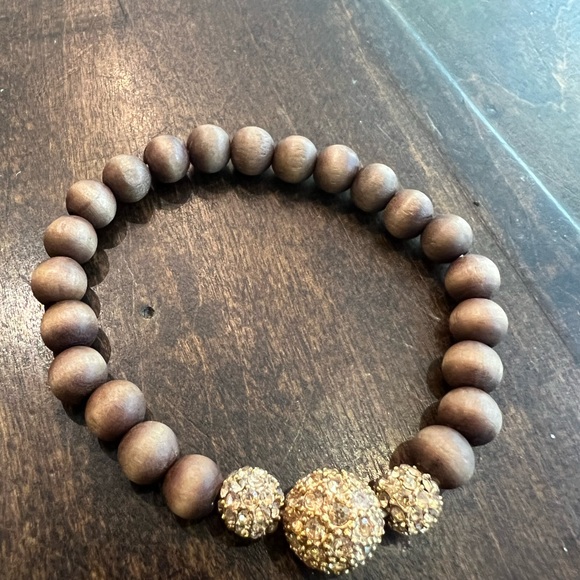 Stella & Dot, brown wood beads with gold center. Lovely piece. Stretch - Picture 2 of 4